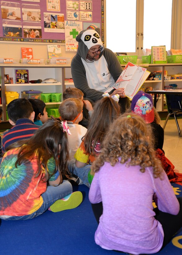 Raúl Alonso, U.S. Army Engineering and Support Center Huntsville Energy Division program manager, dressed as a lemur to read to Mill Creek Elementary School kindergarten students during National Education Association's Read Across America Day, March 2.