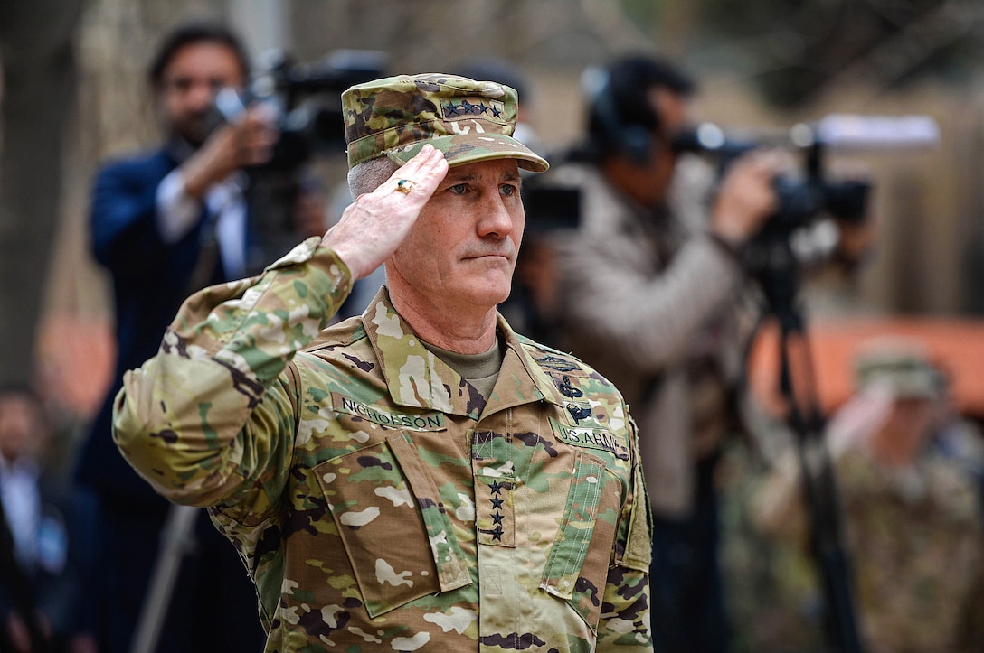 Army Gen. John W. Nicholson Jr. salutes during U.S. and Afghan national anthems before the change-of-command ceremony for U.S. Forces Afghanistan and the Resolute Support Mission in Kabul, Afghanistan, March 2, 2016. Air Force photo by Staff Sgt. Tony Coronado