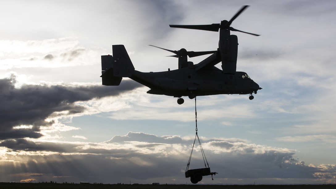 A U.S. Marine Corps MV-22 Osprey with Marine Medium Tiltrotor Squadron 263, Special-Purpose Marine Air-Ground Task Force-Crisis Response- Africa conducts an external load operation during exercise Sky Soldier at La Felipe drop zone, Spain, Feb. 27, 2016. SPMAGTF-CR-AF participated in exercise Sky Soldier which promotes interoperability between Marine Corps Aviation assets and American and Spanish Airborne and Air Mobile forces.