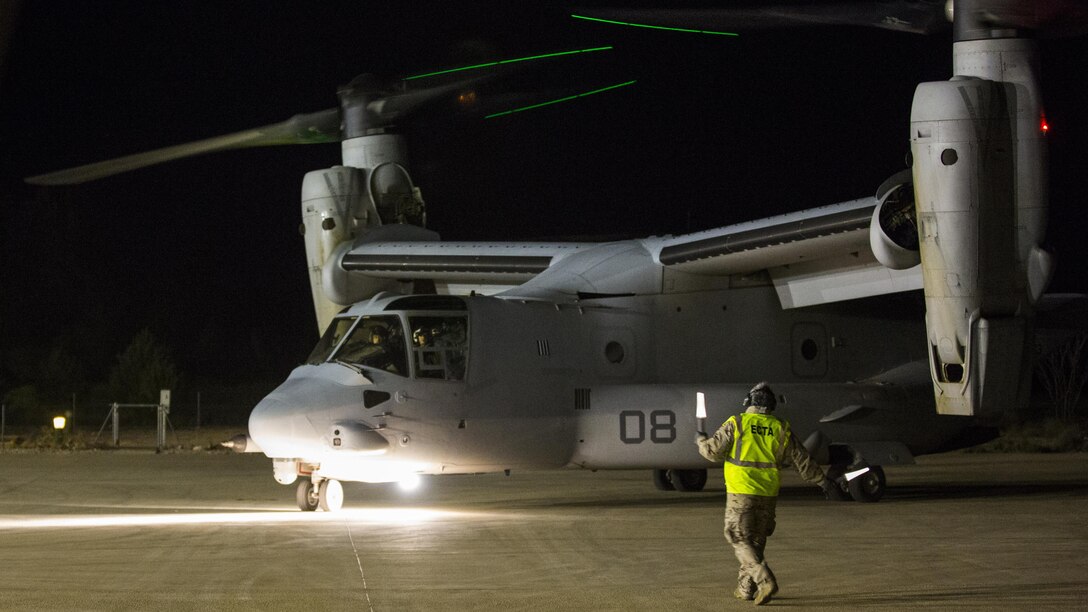 A Spanish Airman gives hand and arm signals to a U.S. Marine Corps MV-22 Osprey with Marine Medium Tiltrotor Squadron 263, Special-Purpose Marine Air-Ground Task Force-Crisis Response- Africa enroute to return to Morón Air Base from La Felipe drop zone after conducting insertion operations in exercise Sky Soldier, Albacete airport, Spain, Feb. 27, 2016. SPMAGTF-CR-AF participated in exercise Sky Soldier which promotes interoperability between Marine Corps Aviation assets and American and Spanish Airborne and Air Mobile forces.