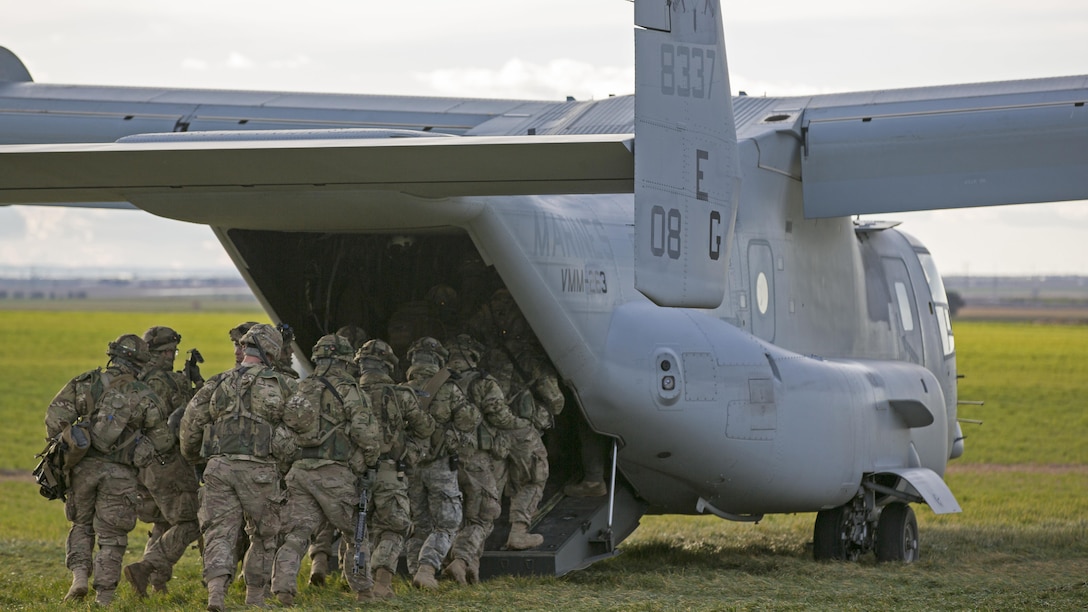 U.S. soldiers with 173rd Airborne Brigade Combat Team load onto a U.S. Marine Corps MV-22 Osprey with Marine Medium Tiltrotor Squadron 263, Special-Purpose Marine Air-Ground Task Force-Crisis Response- Africa during exercise Sky Soldier, La Felipe drop zone, Spain, Feb. 27, 2016. SPMAGTF-CR-AF participated in exercise Sky Soldier which promotes interoperability between Marine Corps Aviation assets and American and Spanish Airborne and Air Mobile forces.