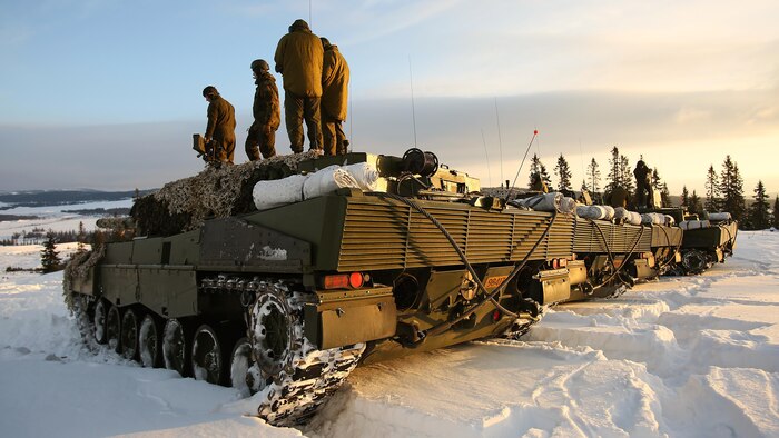 Norwegian Leopard tank crews from the Telemark Battalion prepare for a live-fire exercise in Rena, Norway, Feb. 18, 2016. The U.S. Marines and Norwegians are preparing for Exercise Cold Response 16, which will bring together 12 NATO Allied and partner nations and approximately 16,000 troops in order to enhance joint crisis response capabilities in cold weather environments. The Norwegian Telemark Battalion instructed various U.S. Marine units on cold weather survival techniques to driving armored vehicles on ice-covered roads in the weeks leading up to exercise Cold Response 16 beginning at the end of the month.  The two nations along with the other participating countries will conduct multi-lateral training to improve U.S. Marine Corps capability to operate in cold-weather environments.