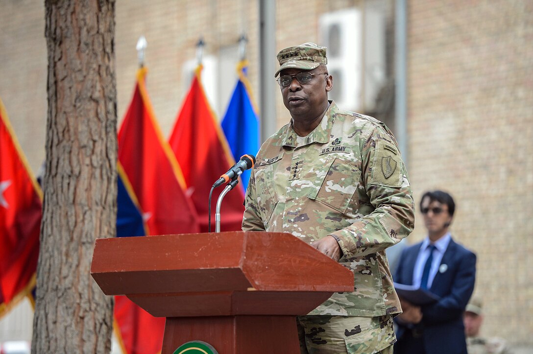 Army Gen. Lloyd J. Austin III, left, commander of U.S. Central Command, speaks about Army Gen. John F. Campbell, the outgoing commander of U.S. Forces Afghanistan and NATO’s Resolute Support Mission, and Army Gen. John W. Nicholson Jr., the incoming commander, during the change-of-command ceremony in Kabul, Afghanistan, March 2, 2016. Air Force photo by Staff Sgt. Tony Coronado