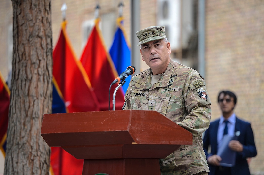 Army Gen. John F. Campbell, outgoing commander of U.S. Forces Afghanistan and the NATO Resolute Support Mission, speaks to service members during a change-of-command ceremony in Kabul, Afghanistan, March 2, 2016. Air Force photo by Staff Sgt. Tony Coronado