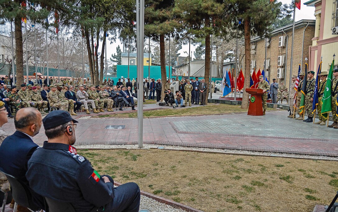 Army Gen. John W. Nicholson Jr., behind the podium, commander of U.S. Forces Afghanistan and NATO’s Resolute Support Mission, addresses service members and guests during a change-of-command ceremony in Kabul, Afghanistan, March 2, 2016. Air Force photo by Staff Sgt. Tony Coronado