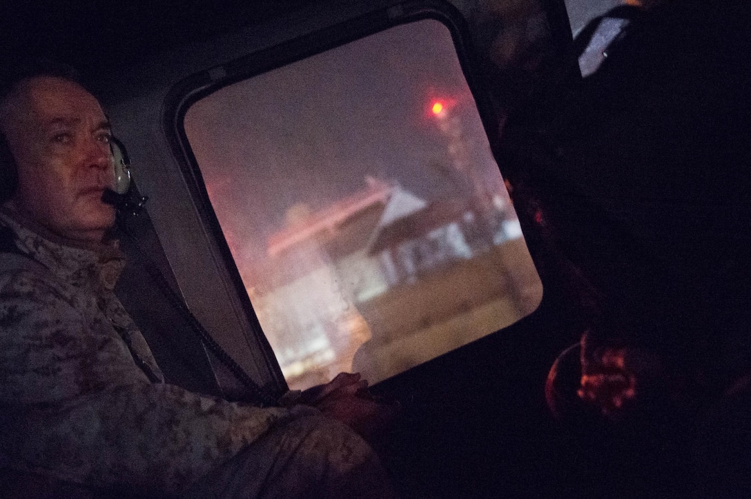 Marine Corps Gen. Joseph F. Dunford Jr., chairman of the Joint Chiefs of Staff, flies into Kabul, Afghanistan, March 1, 2016, on a UH-60 Blackhawk helicopter. DoD photo by D. Myles Cullen