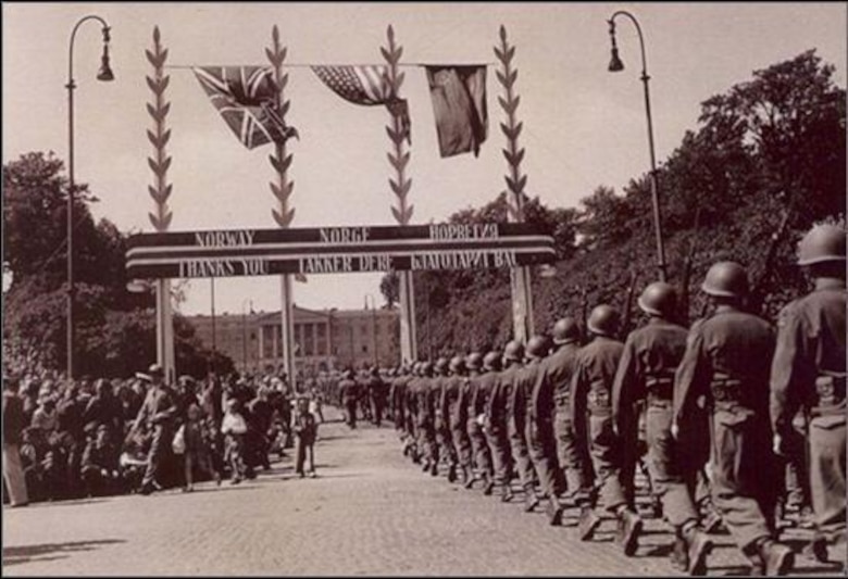 The 99th Infantry Battalion marching on Allied Forces Day in Oslo, Norway, celebrating the victory and honoring the brave soldiers that won the war. Maj. William Colby led a group of men from the battalion during Operation Rype in sabotage missions aimed at preventing German troops from moving in Norway during World War II.