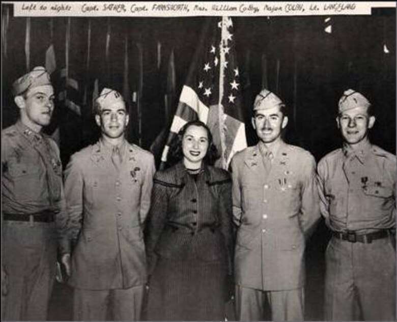 Members of the 99th Infantry Battalion from left to right are Capt. Saeter, Capt. Farnsworth, Mrs. Colby (not a member), Maj. Colby, and Lt. Langeland. Colby led a group of men from the battalion during Operation Rype in sabotage missions aimed at preventing German troops from moving in Norway during World War II.