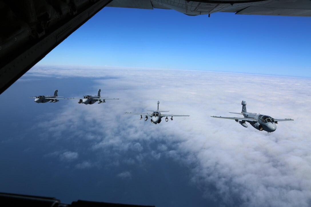 Four EA-6B Prowlers belonging to each Prowler squadron aboard Marine Corps Air Station Cherry Point conducted a "Final Four" division flight aboard the air station March 1, 2016. The "Final Four" flight is the last time the Prowler squadrons will be flying together before the official retirement of Marine Tactical Electronic Warfare Training Squadron 1 at the end of Fiscal Year 16 and the eventual transition to "MAGTF EW". MAGTF EW is a more distributed strategy where every platform contributes to the EW mission, enabling relevant tactical information to move throughout the electromagnetic spectrum and across the battlefield faster than ever before. (U.S. Marine Corps photo by Cpl. N.W. Huertas/Released)