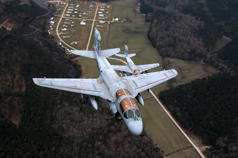 Four EA-6B Prowlers belonging to each Prowler squadron aboard Marine Corps Air Station Cherry Point conducted a "Final Four" division flight aboard the air station March 1, 2016. The "Final Four" flight is the last time the Prowler squadrons will be flying together before the official retirement of Marine Tactical Electronic Warfare Training Squadron 1 at the end of Fiscal Year 16 and the eventual transition to "MAGTF EW". MAGTF EW is a more distributed strategy where every platform contributes to the EW mission, enabling relevant tactical information to move throughout the electromagnetic spectrum and across the battlefield faster than ever before. (U.S. Marine Corps photo by Cpl. N.W. Huertas/Released)