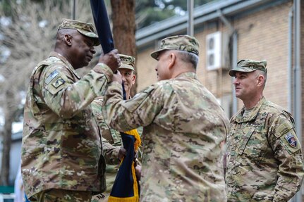 Army Gen. Lloyd J. Austin III, left, commander of U.S. Central Command, and Gen. John F. Campbell, the outgoing commander of U.S. Forces Afghanistan and NATO’s Resolute Support Mission, participate in a passing of the colors during a change-of-command ceremony in Kabul, Afghanistan, March 2, 2016. Campbell turned over command to Gen. John W. Nicholson Jr., center, during the ceremony. Air Force photo by Staff Sgt. Tony Coronado