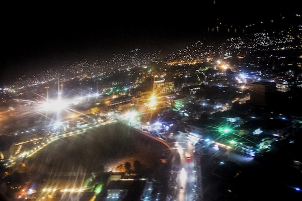 A view from a UH-60 Blackhawk helicopter shows the night lights in Kabul, Afghanistan, March 1, 2016, as Marine Corps Gen. Joseph F. Dunford, chairman of the Joint Chiefs of Staff, arrives to meet with leaders. DoD photo by D. Myles Cullen