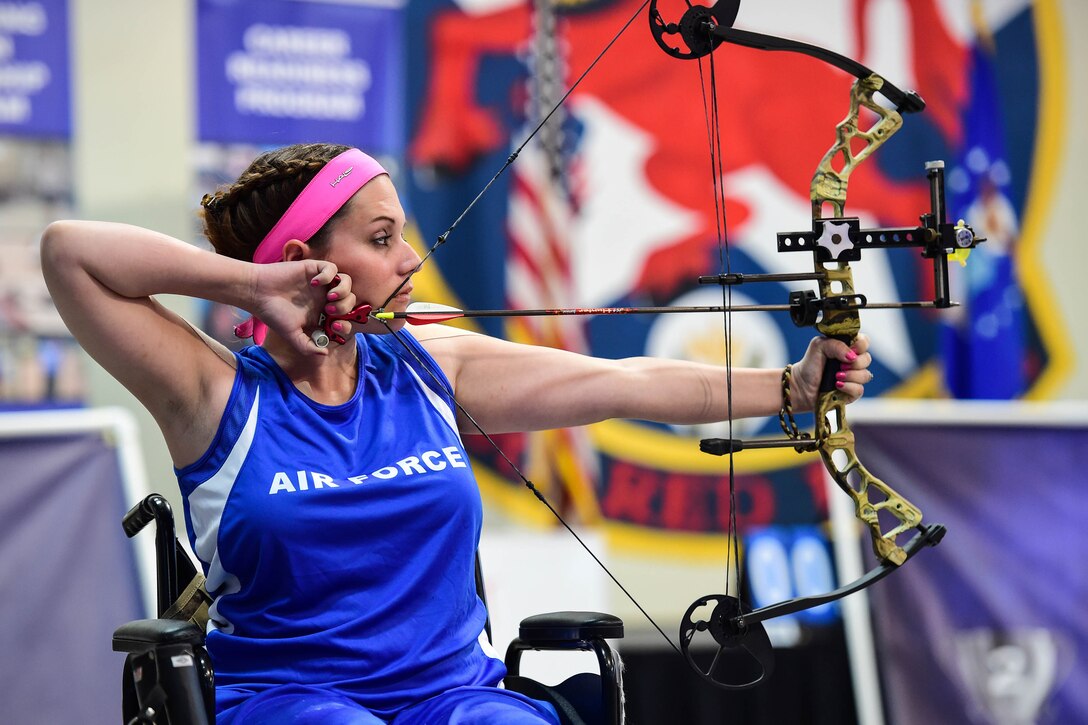 Ashley Crites prepares to fire an arrow during the 2016 Air Force Trials on Nellis Air Force Base, Nev., Feb. 29, 2016. The adaptive sports event promotes the mental and physical well-being of seriously wounded, ill and injured military members and veterans. More than 100 wounded, ill or injured service men and women from around the country will compete for a spot on the 2016 Warrior Games Team. Air Force photo by Senior Airman Taylor Curry