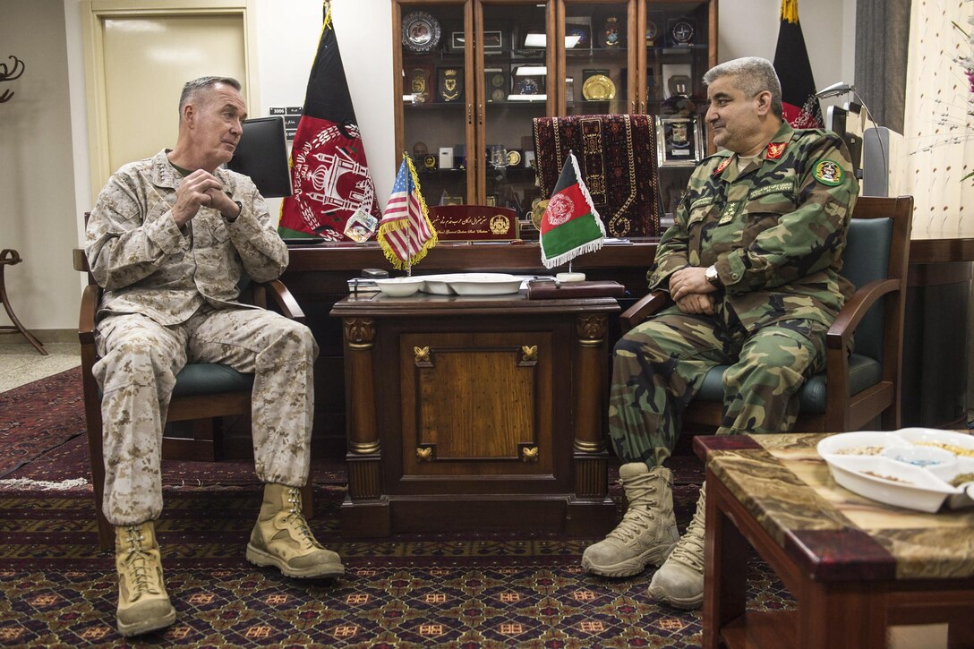 Marine Corps Gen. Joseph F. Dunford Jr., chairman of the Joint Chiefs of Staff, left, meets with Afghan Lt. Gen. Qadam Shah Shameem, chief of armed forces, at the Defense Ministry in Kabul, Afghanistan, March 2, 2016. DoD photo by D. Myles Cullen