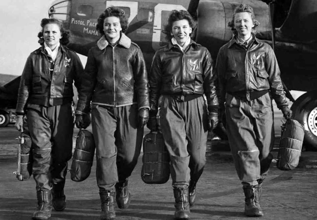 Women Airforce Service pilots Frances Green, Margaret "Peg" Kirchner, Ann Waldner and Blanche Osborn, leave their B-17 Flying Fortress aircraft, "Pistol Packin' Mama," during ferry training at Lockbourne Army Airfield, Ohio, 1944. Air Force photo