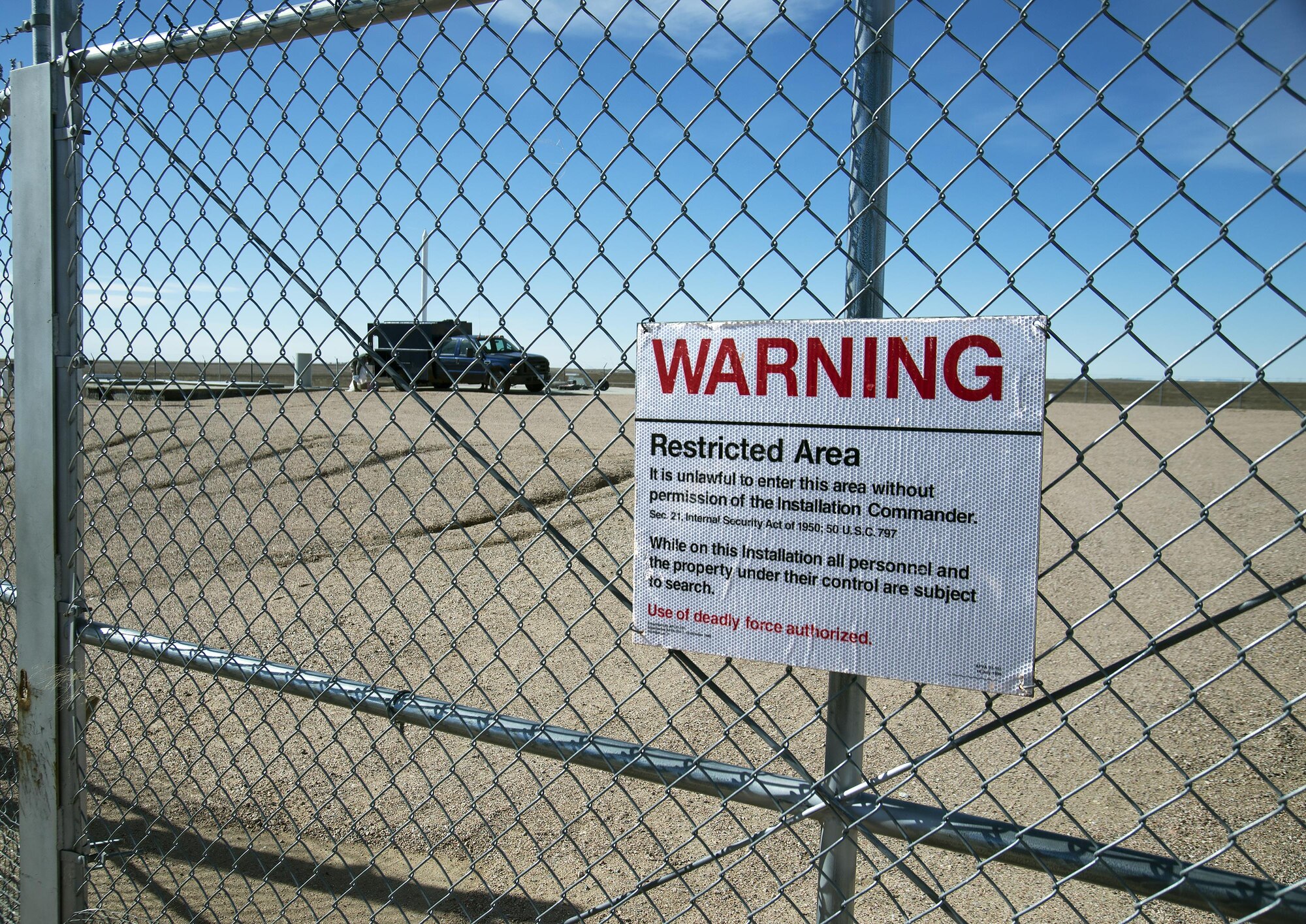 Airmen of the 90th Missile Wing arrive at Launch Facility Alpha-10 in Laramie County, Wyo., Feb. 19, 2016, to start the process of opening the access hatch so maintainers can work on the Minuteman III missile inside. A number of missiles belonging to the 90th MW had to be repostured following a Simulated Electronic Launch-Minuteman test. (U.S. Air Force photo by R.J. Oriez)