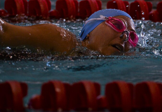 A member of team USA competes in the 50 meter freestyle during the 2016 Air Force Wounded Warrior Trials at the University of Las Vegas indoor pool, Las Vegas, Nev., Feb. 28, 2016. Service members are participating in adaptive athletic reconditioning for lasting effects on physical and emotional recovery. (U.S. Air Force photo by Airman 1st Class Kevin Tanenbaum)
