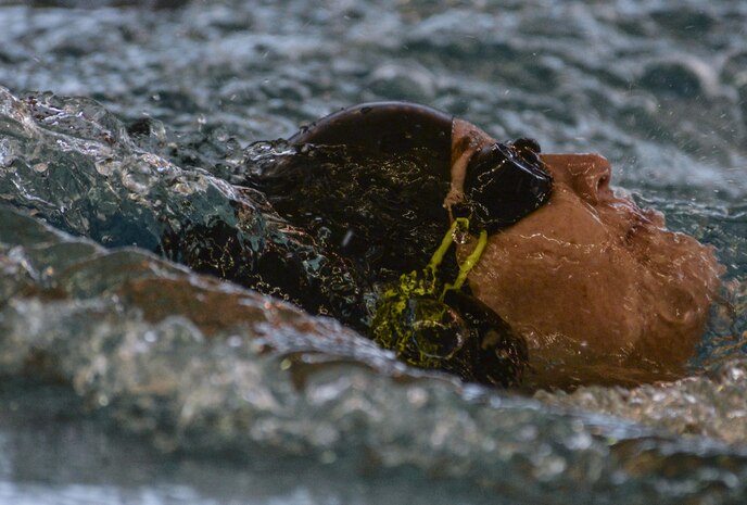 A member of team USA competes in the 100 meter backstroke during the 2016 Air Force Wounded Warrior Trials at the University of Las Vegas indoor pool, Las Vegas, Nev., Feb. 28, 2016. Service members are participating in adaptive athletic reconditioning for lasting effects on physical and emotional recovery. (U.S. Air Force photo by Airman 1st Class Kevin Tanenbaum)