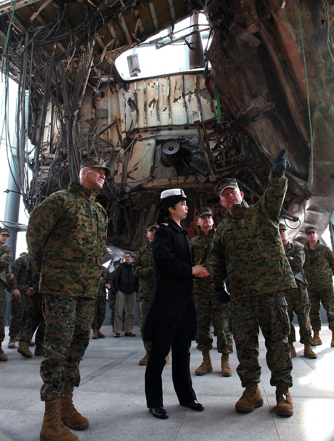Lt. Gen. Lawrence D. Nicholson (right), III Marine Expeditionary Force Commanding General, Maj. Gen. Richard L. Simcock II (left), 3rd Marine Division Commanding General, and Brig. Gen. Russell A.C. Sanborn (center), 1st Marine Aircraft Wing Commanding General, tour the Republic of Korea Ship Cheonan, Feb. 23, 2016 on Pyeongtaek Naval Base, South Korea. The Cheonan was struck and sunk by a North Korean torpedo, March 26, 2010, killing 46 sailors in the attack. More than 60 Marines and sailors with III MEF, III MEF subordinate commands and adjacent commands based in Japan and South Korea, met in the South in order to uphold and strengthen the alliance between the ROK and the U.S., and reinforce their commitment to defend the country at a moment’s notice. The visit took place in various locations throughout the country, enhancing U.S. Marines' familiarization of the Korean Peninsula while simultaneously developing the kind of faith and trust between forces that can only be established through constant engagement, as well as rigorous and realistic training. (Official USMC photo by GySgt Jeremy Vought)