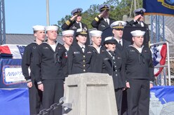 Sailors sing the National Anthem during the graduation ceremony of Nuclear Power School class 1506 at Naval Nuclear Power Training Command (NNPTC) in Goose Creek, S.C. Based at Joint Base Charleston-Naval Weapons Station, NNPTC trains Sailors in fundamentals of design, operation, and maintenance of shipboard nuclear propulsion plants. (U.S. Navy photo by Mass Communication Specialist Second Class Corey Dill)