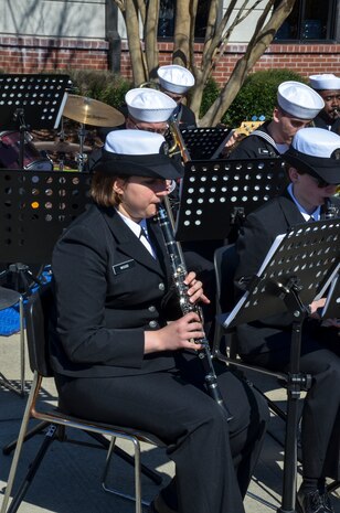 Sailors play music during the graduation ceremony of Nuclear Power School class 1506 at Naval Nuclear Power Training Command (NNPTC) in Goose Creek, S.C. Based at Joint Base Charleston-Naval Weapons Station, NNPTC trains Sailors in fundamentals of design, operation, and maintenance of shipboard nuclear propulsion plants. (U.S. Navy Photo by Mass Communication Specialist Second Class Corey Dill)