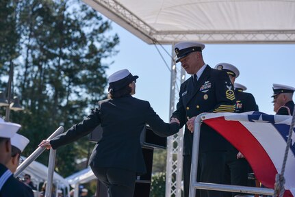 Sailors participate in the graduation ceremony of Nuclear Power School class 1506 at Naval Nuclear Power Training Command (NNPTC) in Goose Creek, S.C. Based at Joint Base Charleston-Naval Weapons Station, NNPTC trains Sailors in fundamentals of design, operation, and maintenance of shipboard nuclear propulsion plants. (U.S. Navy Photo by Mass Communications Specialist Second Class Jason Pastrick)
