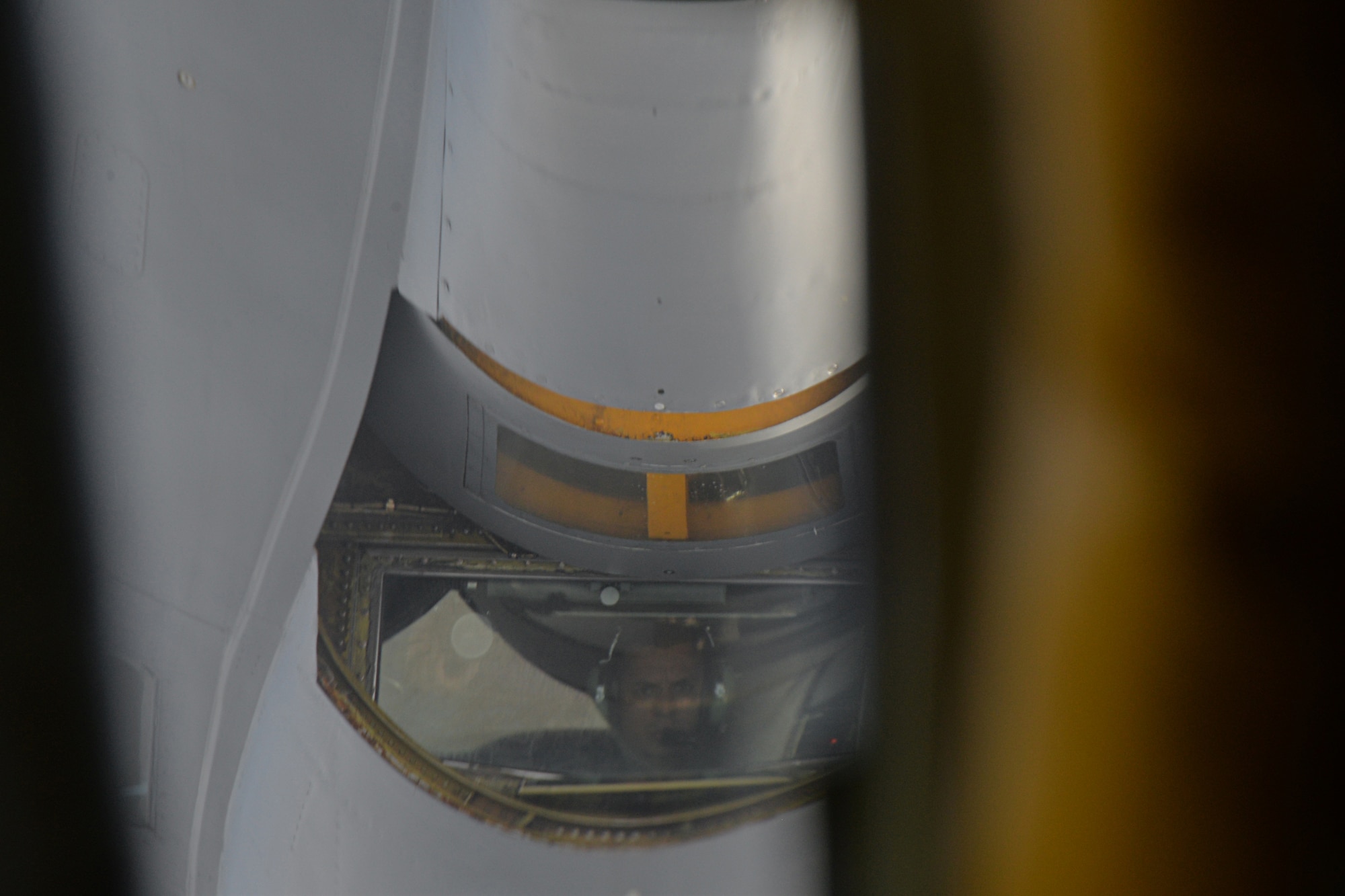 Senior Master Sgt. Cesar Flores, 351st Air Refueling Squadron superintendent, concentrates as he transfers nearly 70,000 pounds of fuel from a KC-135 Stratotanker to a B-52 Stratofortress during an aerial refueling over the English Channel, March 1, 2016. The KC-135 is capable of delivering 200,000 pounds of fuel to a wide variety of aircraft, and is a critical component of the U.S.’ dominance of the skies. (U.S. Air Force photo/Senior Airman Joseph Raatz)