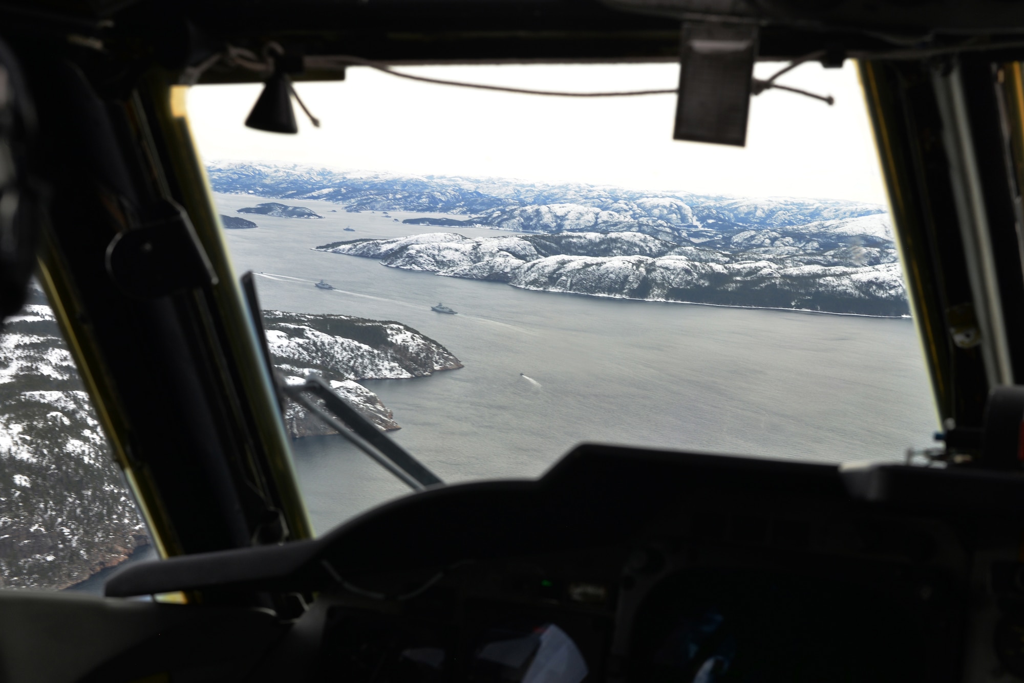 Naval vessels participating in NATO exercise Cold Response 16 sail up a fjord in the Trøndelag region of Norway, March 1, 2016. This year’s iteration of the biennial training exercise involves maritime, ground and air operations with assets from a dozen Allied and partner nations. Exercises like these provide an opportunity for military units to work together to develop tactics, policies and procedures that make joint-operations successful. (U.S. Air Force photo/Senior Airman Joseph Raatz)