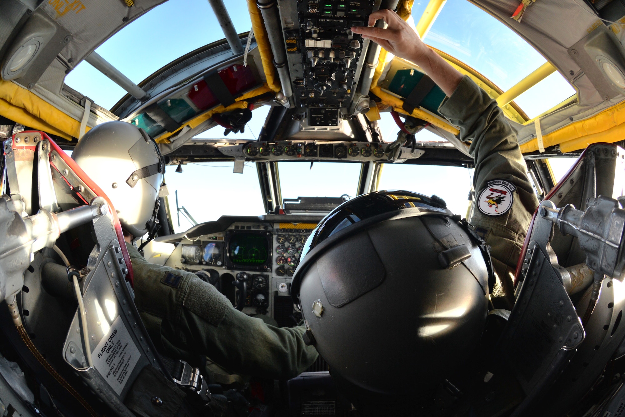 Capt.  Brian D’Arcy, B-52 Stratofortress copilot with the 2nd Bomb Wing’s 20th Bomb Squadron, adjusts radio frequencies during a flight to the Trøndelag region of Norway as part of NATO exercise Cold Response 16, March 1, 2016. This year’s iteration of the biennial military training exercise included air assets such as the B-52, F-16 Fighting Falcon, P-3 Orion and KC-135 Stratotanker, among others.  (U.S. Air Force photo/Senior Airman Joseph Raatz)