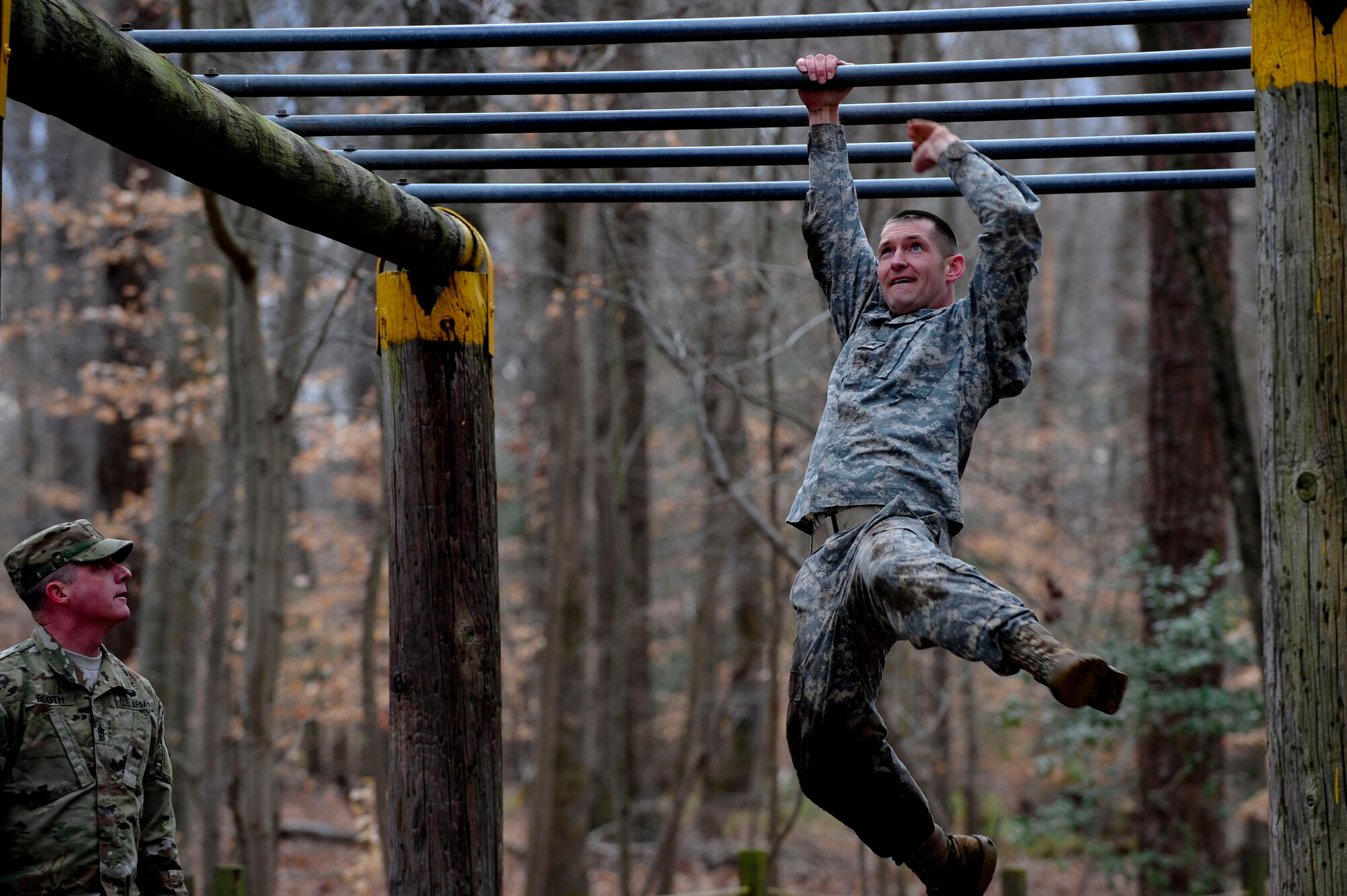 A U.S. Army Soldier completes an obstacle during the 128th Aviation Brigade Noncommissioned Officer of the Year and Platoon Sergeant of the Year Competition obstacle course at Fort Eustis, Va., Feb. 25, 2016. Supervisors and senior enlisted members participated in the obstacle course alongside the competitors. (Airman 1st Class Breonna Veal)
