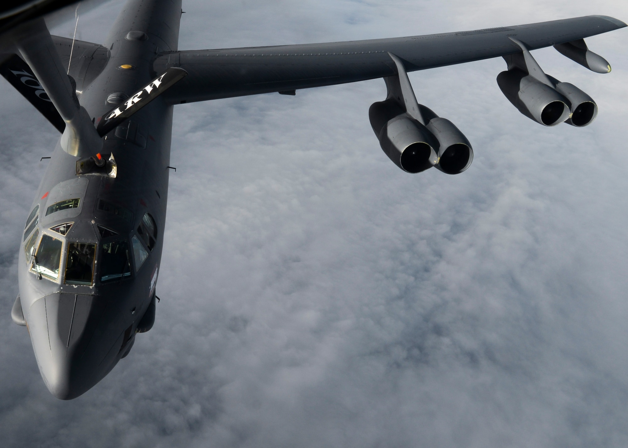 A U.S. Air Force B-52 Stratofortress assigned to Barksdale Air Force Base, La., receives fuel from a KC-135 Stratotanker assigned to RAF Mildenhall, England, over the Trøndelag region of Norway, while participating in exercise Cold Response. The exercise provides an opportunity for allies to train together and better understand how each operates and communicates.(U.S. Air Force photo by Senior Airman Victoria H. Taylor/Released)