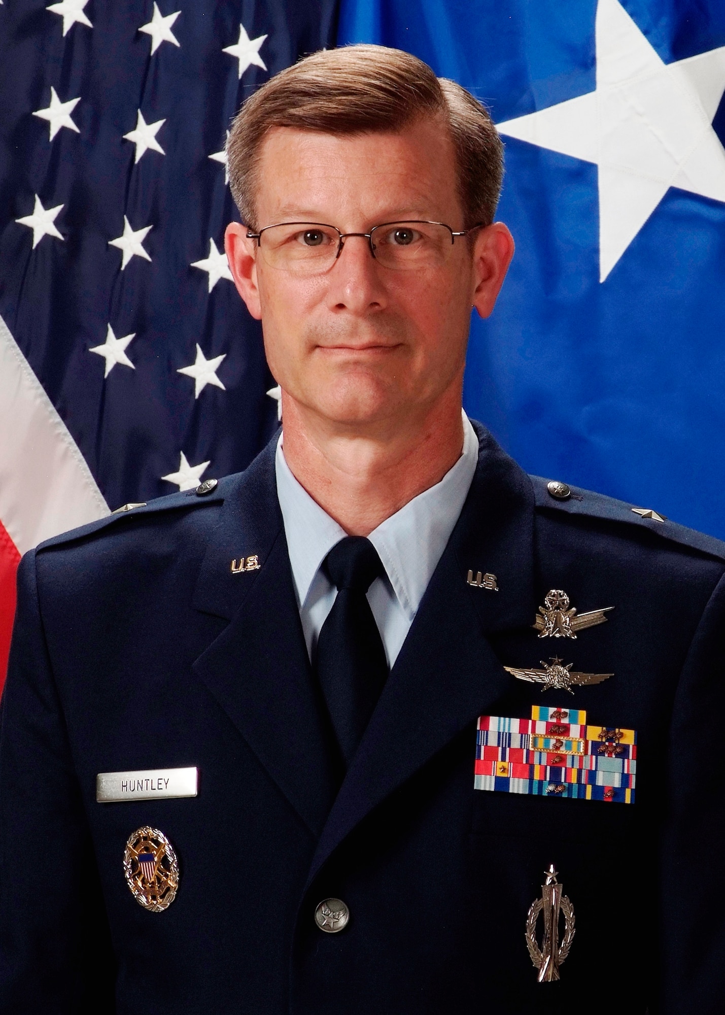 PETERSON AIR FORCE BASE, Colo. - Brig. Gen. Ronald L. Huntley, director of Financial Management and Comptroller, Headquarters Air Force Space Command, retires March 4 after 33 years of dedicated service to the Air Force.
