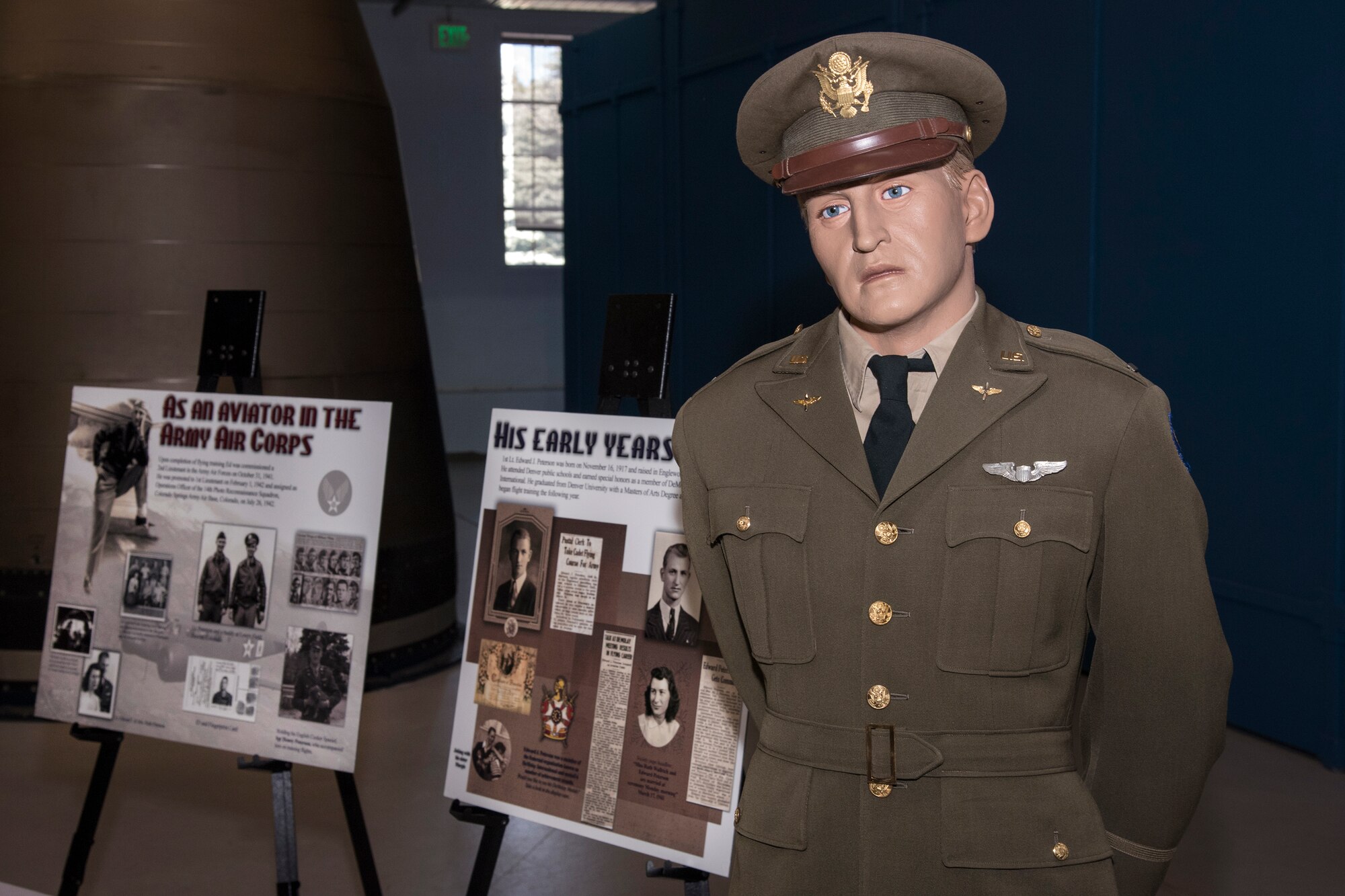 PETERSON AIR FORCE BASE, Colo. – A statue of 1st Lt. Edward Peterson, Jr. is on display at the Peterson Air and Space Museum Hanger during a ceremony where Peterson was inducted into the DeMolay Hall of Fame. The ceremony was attended by Team Pete personnel and Peterson’s niece, Dot Peterson and nephew Geoff Peterson. Peterson was a member of DeMolay International which was founded in Kansas City, Missouri, in 1919, and is an international organization for young men ages 12 to 21. (U.S. Air Force photo by Craig Denton)