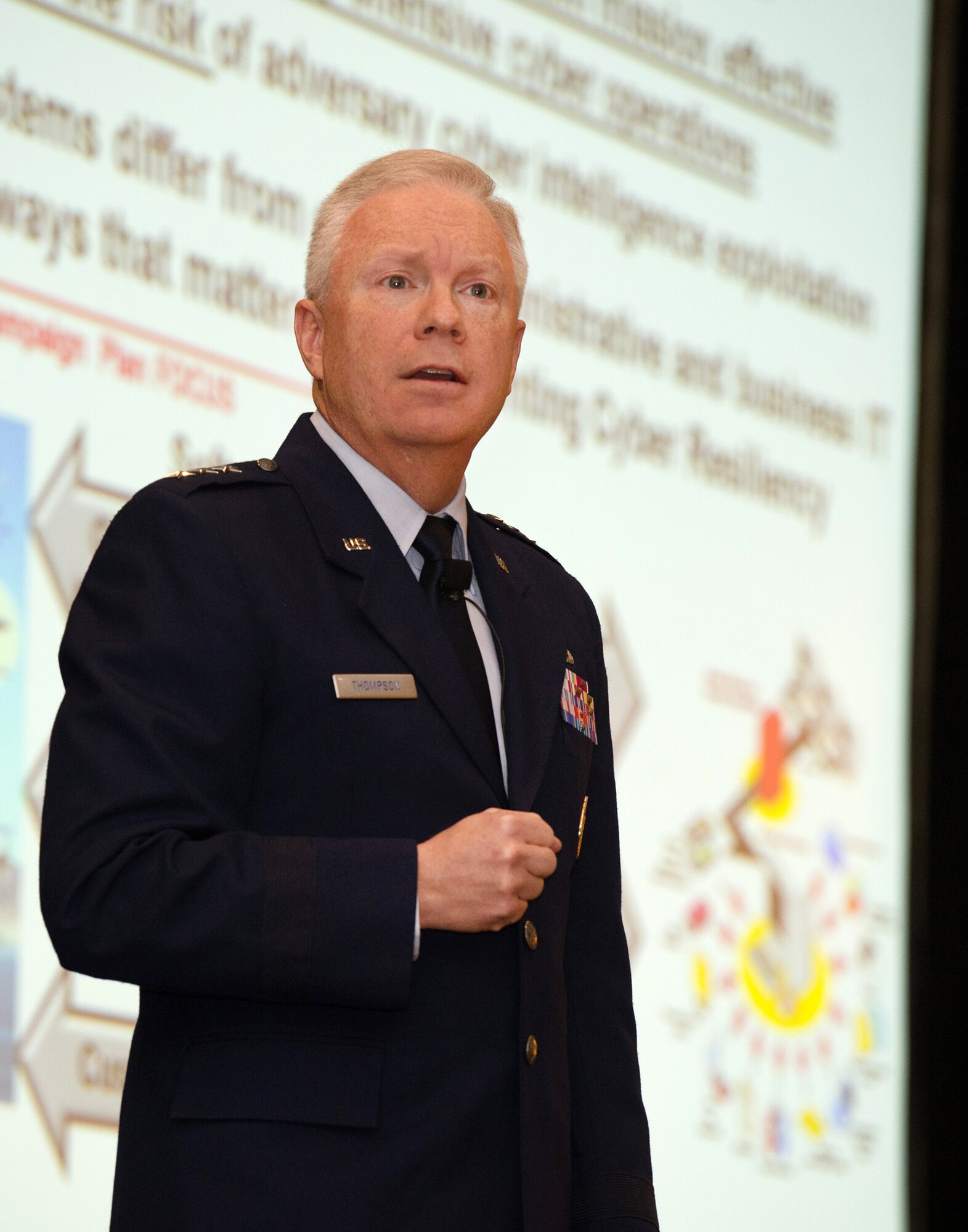 NEWTON, Mass. – Lt. Gen. John Thompson, Air Force Life Cycle Management Center commander, speaks to attendees at the New Horizons Symposium in Newton, Mass., March 1. Thompson highlighted the Air Force Cyber Campaign Plan, including the need for cyber resiliency in all systems. (Photo by Jerry Saslav) 