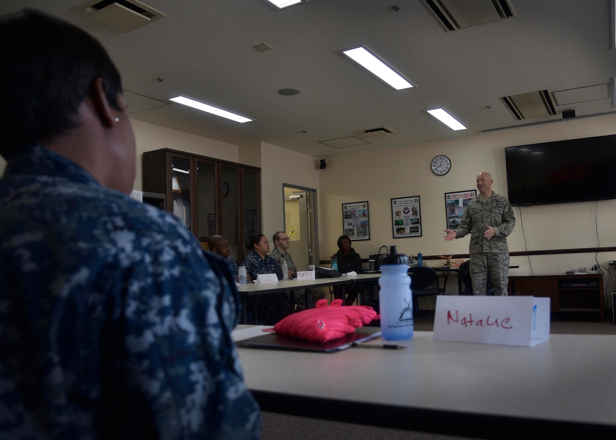 U.S. Air Force Col. Travis Rex, the vice commander of the 35th Fighter Wing, speaks with graduates of the victims advocate training course at Misawa Air Base, Japan, Feb. 26, 2016. In order to become a victim advocate, volunteers must hold the grade of E-4, O-2, GS-07 or higher, have an interview with the Sexual Assault Response Coordinator, pass a background check, attend this course and become certified by the Department of Defense Sexual Assault Advocate Certification Program. (U.S. Air Force photo by Senior Airman Deana Heitzman)