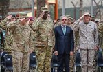 Marine Corps Gen. Joseph F. Dunford Jr., right, Army Gen. John F. Campbell, left, and Army Gen. Lloyd J. Austin III salute and stand with Afghan Chief Executive Officer Abdullah Abdullah during the change-of-command ceremony on Camp Resolute Support in Kabul, Afghanistan, March 2, 2016. (Air Force photo by Staff Sgt. Tony Coronado)