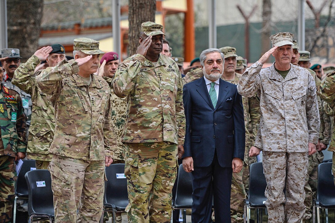 Marine Corps Gen. Joseph F. Dunford Jr., right, chairman of the Joint Chiefs of Staff; Army Gen. John F. Campbell, left, outgoing commander of U.S. Forces Afghanistan and the NATO Resolute Support Mission; and Army Gen. Lloyd J. Austin III, commander of U.S. Central Command, salute and stand with Afghan Chief Executive Officer Abdullah Abdullah during the change-of-command ceremony on Camp Resolute Support in Kabul, Afghanistan, March 2, 2016. During the ceremony, Army Gen. John W. "Mick" Nicholson Jr. assumed the command. Air Force photo by Staff Sgt. Tony Coronado