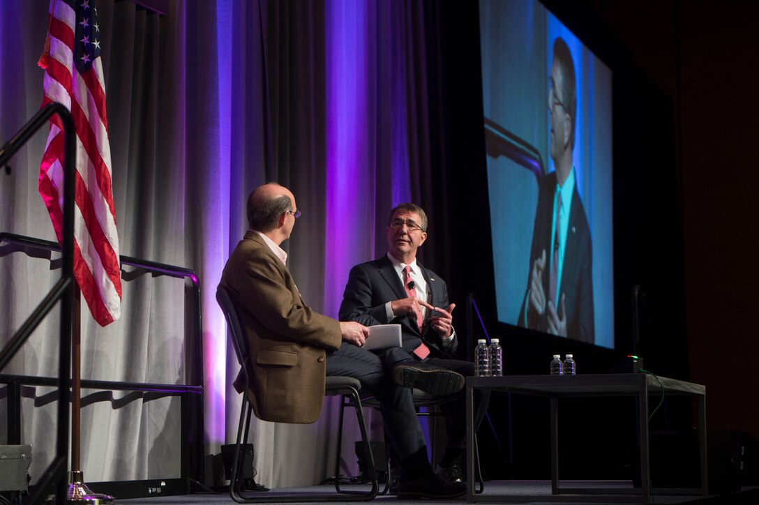 Defense Secretary Ash Carter, right, speaks at the RSA Conference in San Francisco, March 2, 2016. Carter is in San Francisco to strengthen ties between the Department of Defense and the tech community. DoD photo by Navy Petty Officer 1st Class Tim D. Godbee