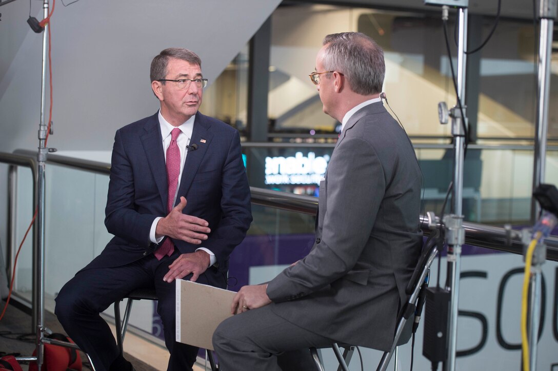 Defense Secretary Ash Carter, left, is interviewed by CNBC's Eamon Javers at the RSA conference in San Francisco, March 2, 2016. Carter is in San Francisco to strengthen ties between the Department of Defense and the tech community. DoD photo by Navy Petty Officer 1st Class Tim D. Godbee