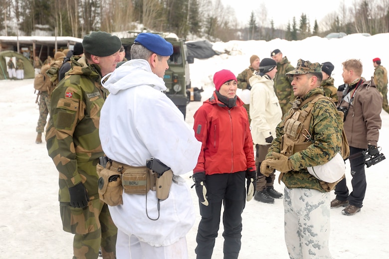 Norwegian Minister of Defense Ine Marie Eriksen Søreide talks with Lt. Col. Justin Ansel, the commanding officer of Task Force 1/8, and officers from Norway and Sweden at a training location near Steinkjer, Norway, March 2, 2016. Exercise Cold Response 16 is a multinational exercise combining the efforts of 13 NATO allies and partner nations and approximately 15,000 troops taking place across Norway. (U.S. Marine Corps photo by Cpl. Dalton A. Precht/released)