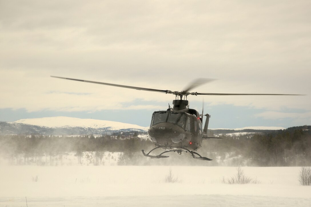 Norwegian Minister of Defense Ine Marie Eriksen Søreide leaves shortly after talking with the U.S. Marines of Task Force 1/8 at a training area near Steinkjer, Norway during Exercise Cold Response March 2, 2016. Cold Response is a multi-national exercise combining the efforts of 12 NATO allies and partner nations and approximately 15,000 troops taking place across Norway. (U.S. Marine Corps photo by Cpl. Dalton A. Precht/released)