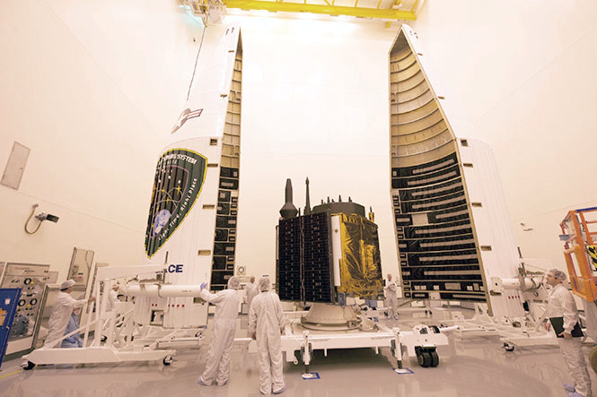 The last GPS IIF satellite is encapsulated inside a payload fairing at a processing facility before it was launched aboard an Atlas V rocket Feb. 5, 2016, at Cape Canaveral Air Force Station, Fla. The mission ended a 27-year legacy of processing second generation GPS satellites for the 45th Space Wing. (Courtesy photo/United Launch Alliance)
