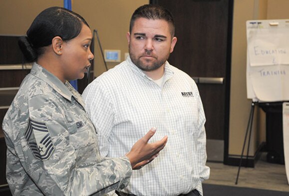 Chief Master Sgt. Melvina Smith, the 71st Mission Support Group superintendent, discusses ways of working together with Jesse Ashlock, the Business and Industry Services coordinator at Autry Technology Center in Enid, Oklahoma, during the Feb. 29 meeting of the newly formed Air Force Community Partnership program. (U.S. Air Force photo/ 2nd Lt. Hailey Schroeder)