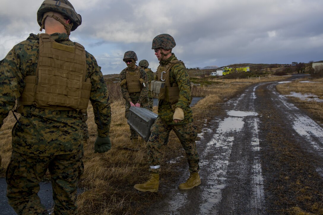 U.S. Marines carry a box containing a FIM-92C Stinger missile that will be fired during Exercise Cold Response 16 at Orland, Norway, Feb. 24, 2016. Marine Corps photo by Cpl. Rebecca Floto