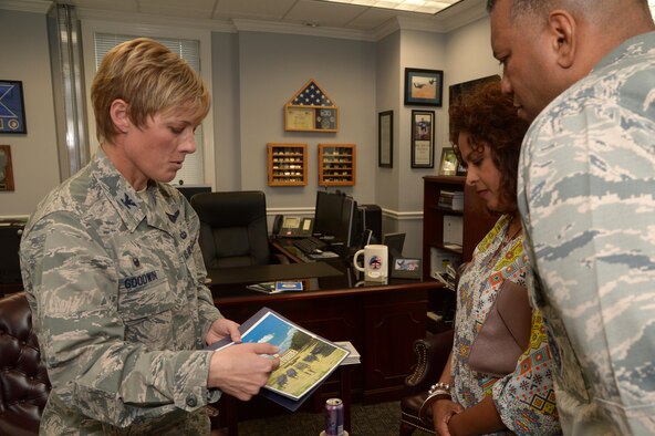 Col. Kristin Goodwin, 2nd Bomb Wing commander, gives Maj. Gen Richard Clark, Eighth Air Force commander, and his spouse Amy, a tour of the 2nd BW headquarters during Clark’s immersion tour at Barksdale Air Force Base, La., Feb. 29, 2016. The 2nd BW had the opportunity to invite Clark down to the wing to tour local operations. (U.S. Air Force photo/Staff Sgt. Joseph A. Pagán Jr.)