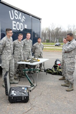 Airmen from 2nd Civil Engineering Squadron Explosive Ordnance Disposal flight brief Maj. Gen. Richard Clark, Eighth Air Force commander, during a tour of the 2nd Bomb Wing at Barksdale Air Force Base, La., March 1, 2016. Clark visited several units across the installation to learn about the local mission and also promote bomber ethos and global focus. (U.S. Air Force photo/Senior Airman Amanda Morris)
