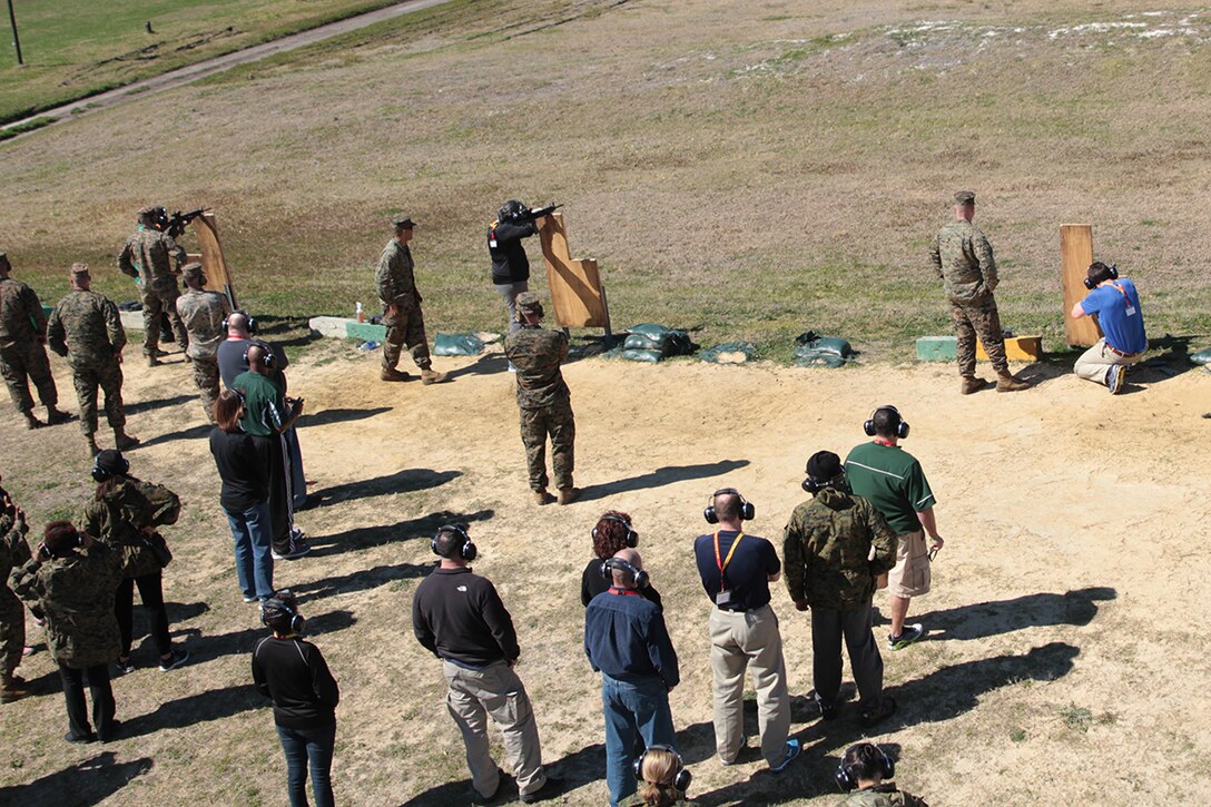 Educators get hands on experience with M16 A4 service rifles during an Educator's Workshop March 2, 2016, aboard Marine Corps Recruit Depot Parris Island, S.C. The three-day workshop gives the educators a glance at what recruits go through during Marine Corps bootcamp. The purpose of the workshop is to give the educators a better understanding of the Marine Corps. The educators are from the greater Atlanta, Ga, and Columbia, S.C., areas. (Official Marine Corps photo by Cpl. Diamond N. Peden/Released)