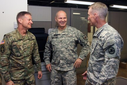 U.S. Army Reserve Brig Gen. Carlton Fisher, deputy chief of chaplains, U.S. Army Reserve Command, left, shares a laugh with Col. David Vanderjagt, garrison chaplain, Fort Knox, Ky., and Sgt. Maj. Dwayne Riden, chief chaplain assistant, 84th Training Command, Fort Knox, during the Command's Unit Ministry Team Workshop on Fort Knox Feb. 17, 2016. (U.S. Army Photo by Clinton Wood/Released)