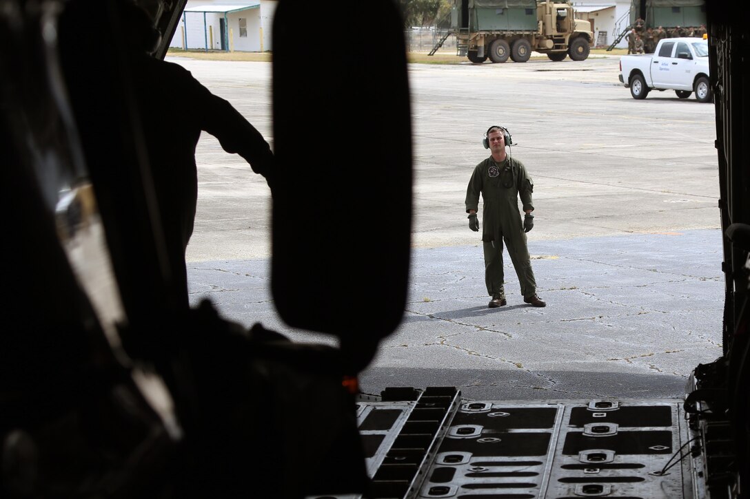 Marines unload a Humvee from a KC-130J Super Hercules during cargo transportation for exercise Eager Response at Marine Corps Air Station Cherry Point, N.C., Feb. 24, 2016. During the exercise, Marines trained in events such as casualty evacuation, assault support missions and aerial refueling, proving the 2nd Marine Aircraft Wing is a highly effective combat force. (U.S. Marine Corps photo by Cpl. N.W. Huertas/ Released)