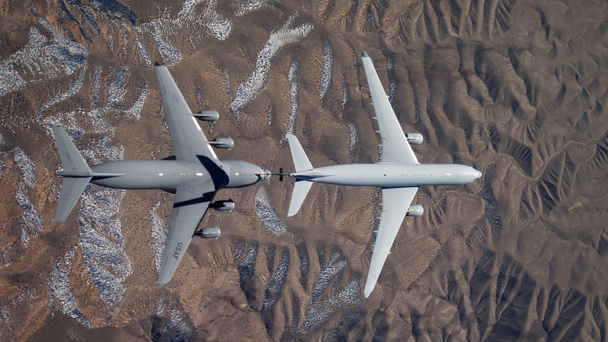 Overhead view of a Royal Australian Air Force KC-30A multirole tanker connecting with a U.S. Air Force C-17 Globemaster III from the 418th Flight Test Squadron at Edwards Air Force Base, Calif., Feb. 10, 2016. (U.S. Air Force photo/Christian Turner)
